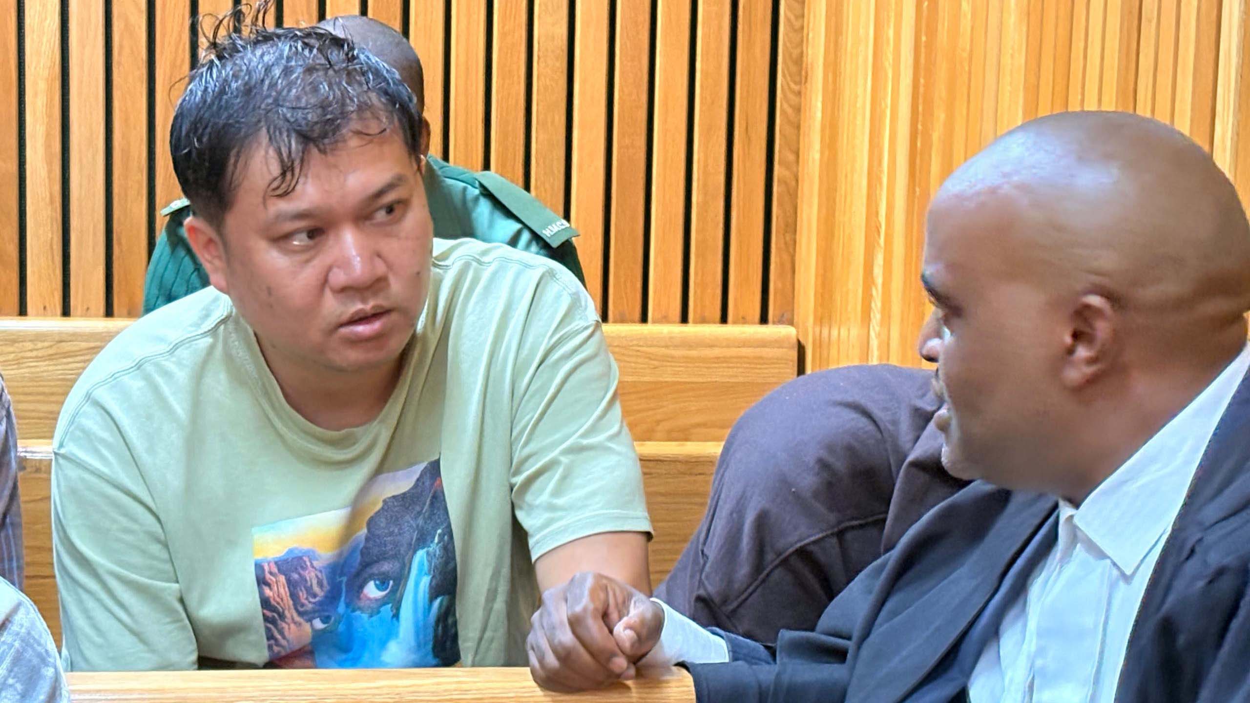Li Peng Chi, a Director of Xwin (Proprietary) Limited, has disputed allegations of unlawfully hiring 20 foreign nationals. He is pictured with Lawyer Sifiso Jele. (Pics Kwanele Dlamini)